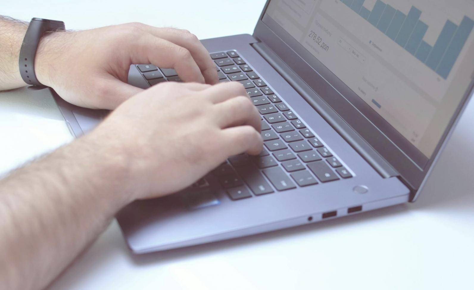 Students collaborating on automated testing projects in modern learning environment